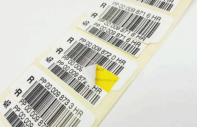 Multilayer self-adhesive label with code